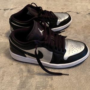 Women’s Jordan 1 Low, Black & Silver, $75